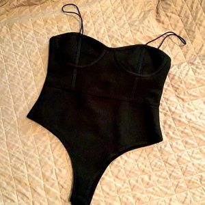 Black structured body suit. Forever 21